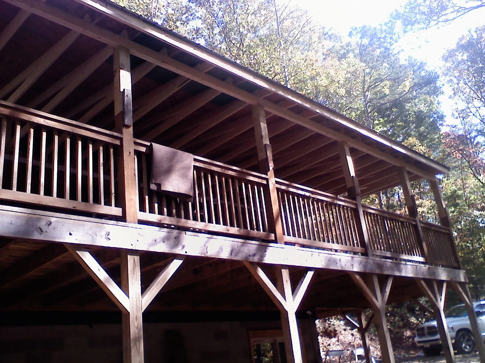 Timber framing under a new elevated porch and deck — Roof Leak Repair in Fletcher by Roofing Brothers